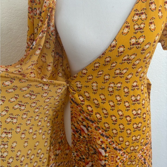 Yellow Flutter Sleeve Wrap Midi Dress - Picture 8 of 11